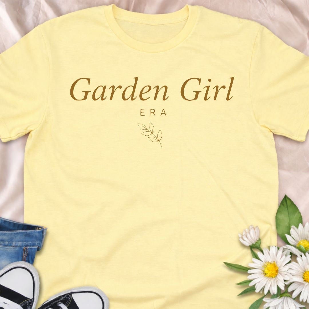 Step into your Garden Girl Era with this minimalist botanical t-shirt. A soft, feminine gardening tee perfect for plant lovers, cottagecore fans, and flower-obsessed women.