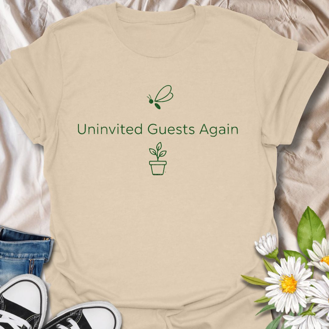 Funny plant lover t-shirt featuring “Uninvited Guests Again” with a plant and gnat illustration. Perfect for houseplant owners who know the struggle with pests. A clean, minimalist botanical tee with niche humor for everyday wear or gifting.