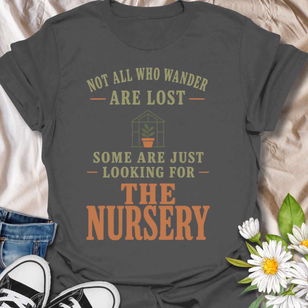 This Not All Who Wander Are Lost t-shirt is made for plant lovers who know some people are simply searching for the nearest garden nursery. Featuring bold vintage-style typography, a small greenhouse and potted plant detail, and warm earthy colors, this design has a funny plant-lover twist on a classic quote. Perfect for gardeners, plant moms, plant dads, nursery shoppers, houseplant collectors, and anyone who can never resist a trip to the Nursery.
