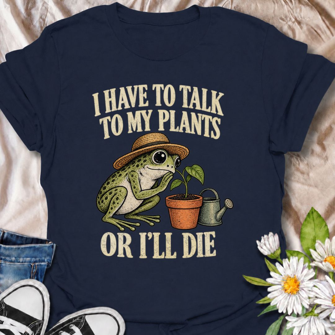 A funny plant T-shirt for anyone who takes conversations with their houseplants very seriously. Featuring a wide-eyed frog in a garden hat leaning in toward a potted plant, this design gives the phrase “I Have to Talk to My Plants or I’ll Die” a playful, slightly absurd feel. It is perfect for plant parents, houseplant lovers, indoor gardeners, and anyone who treats their plants like part of the family. The design makes a fun gift for frog lovers, plant collectors, and people with an ever-growing indoor jun