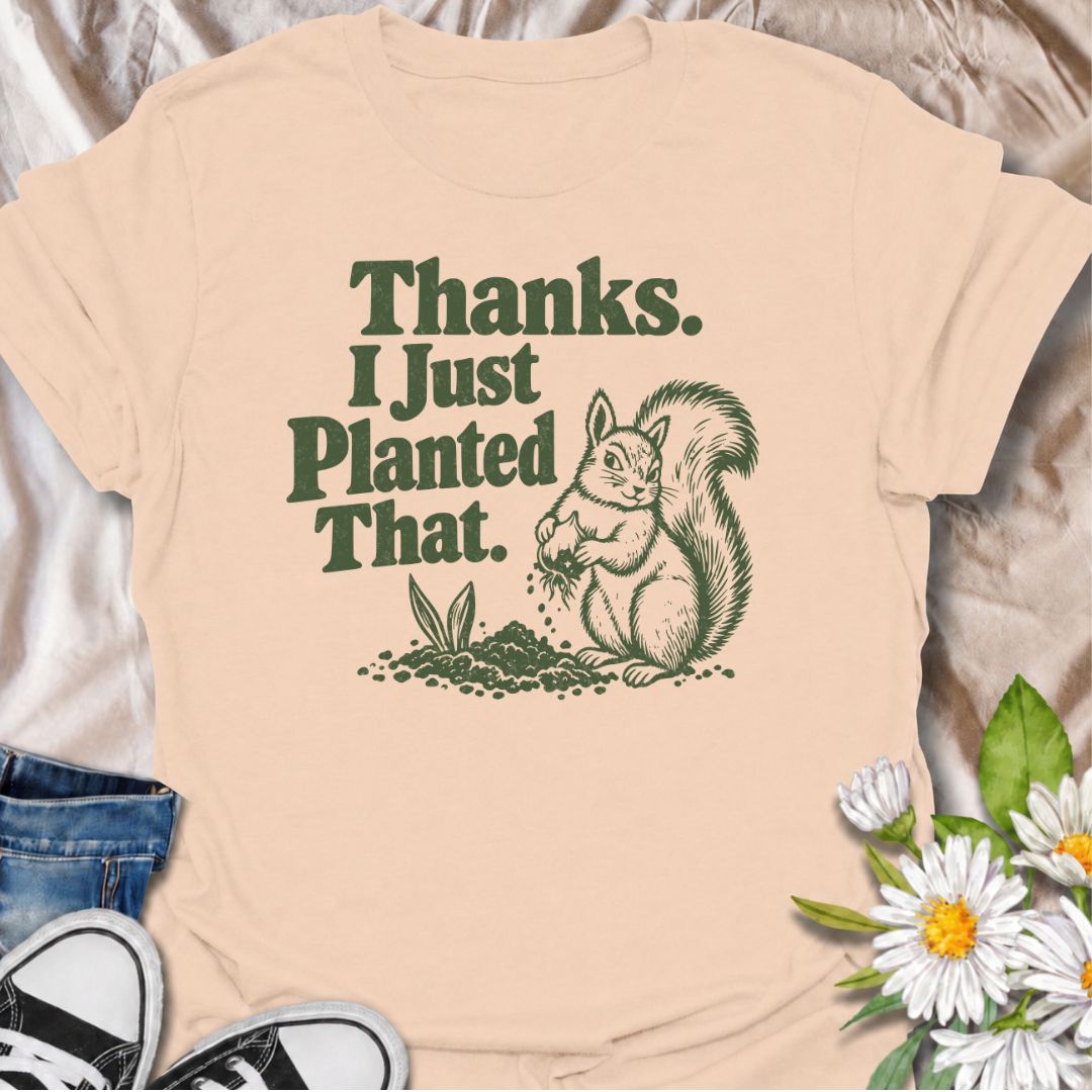 A funny gardening T-shirt for anyone who has ever discovered that a squirrel has been “helping” with the planting. The phrase “Thanks. I Just Planted That.” pairs perfectly with a cheeky squirrel digging around a fresh planting spot for dry, relatable garden humor. It is ideal for backyard gardeners, flower growers, vegetable gardeners, and anyone familiar with wildlife undoing their hard work. The retro-style illustration keeps the design playful without feeling overly cute. A great gift for gardeners, squ
