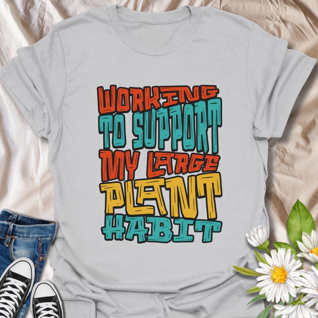 Funny plant lover t-shirt with the phrase “Working to Support My Large Plant Habit” in bold colorful typography. Perfect gift for houseplant collectors, gardeners, plant moms, succulent fans, and anyone obsessed with growing their indoor jungle or backyard
