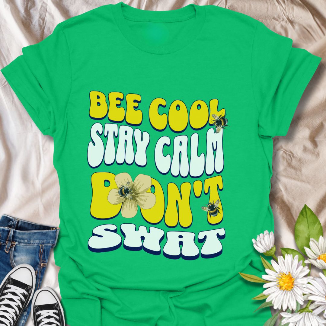 Playful bee-themed t-shirt with "Bee Cool Stay Calm Don't Swat" design. Fun gift for bee lovers, pollinator enthusiasts, and anyone who appreciates a lighthearted garden vibe. Irish Green