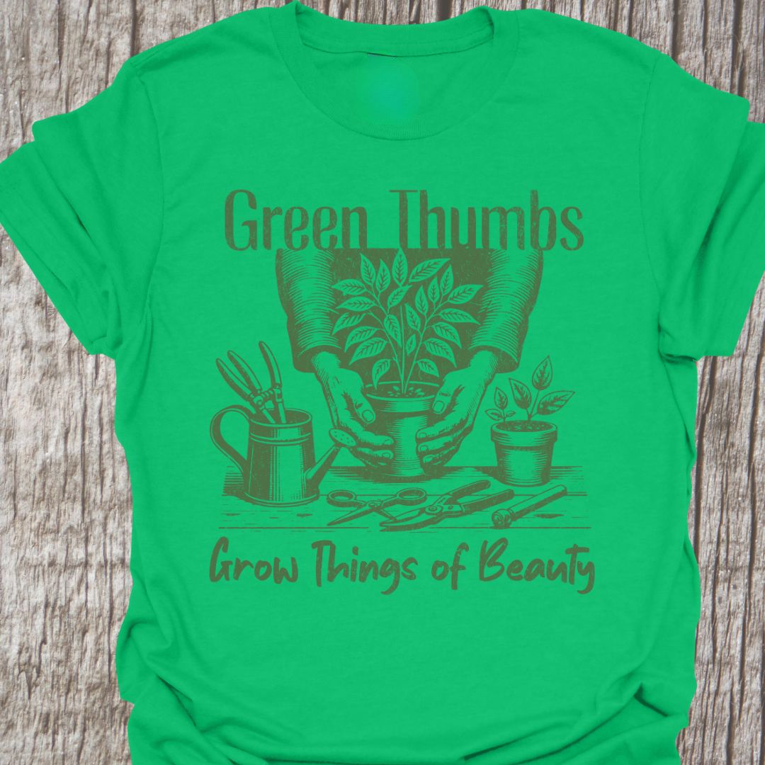 Green Thumbs Grow Things of Beauty text with image of hands holding a plant pot and garden implements around on an Irish green t-shirt