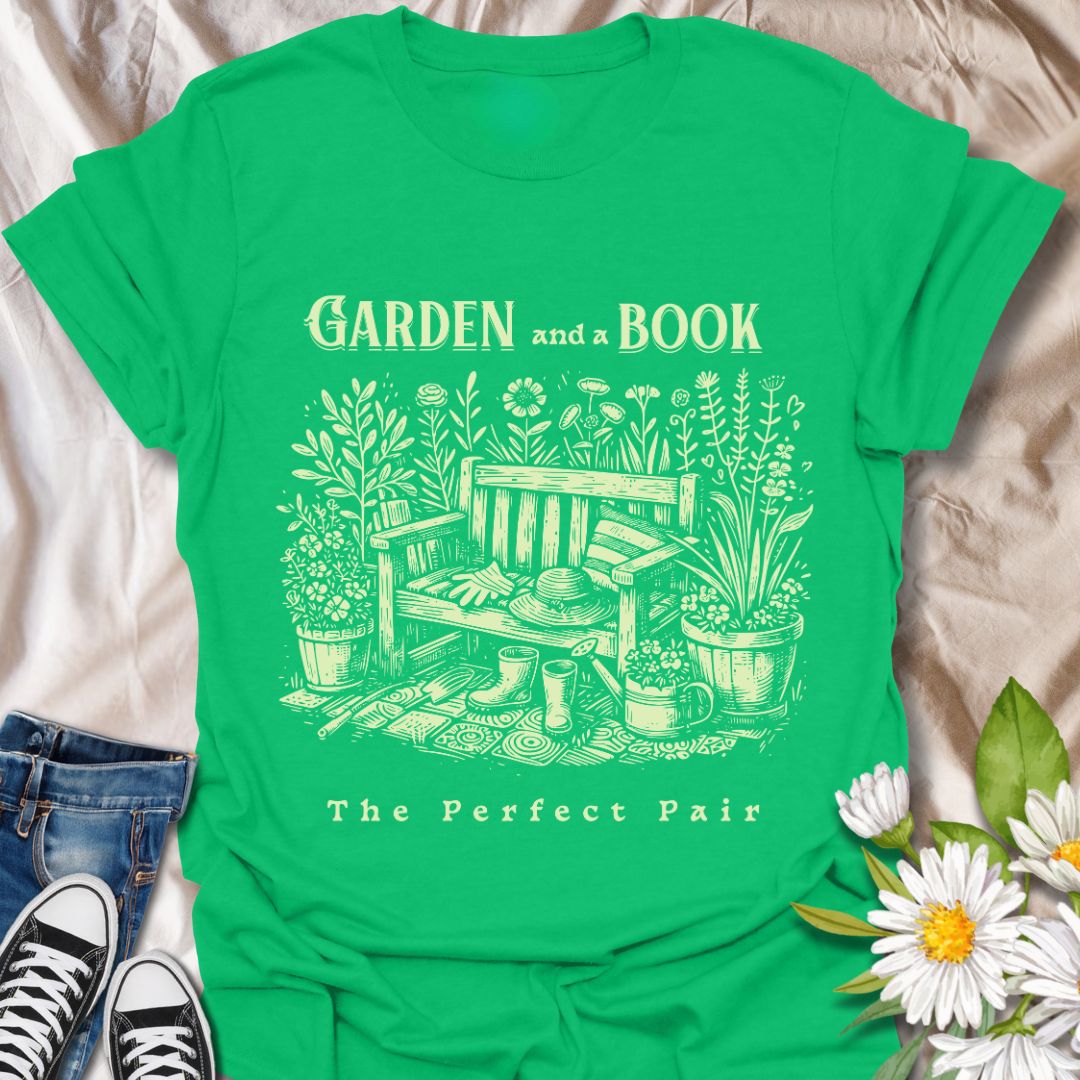 Charming “Garden and a Book - The Perfect Pair” t-shirt featuring a vintage-style garden bench, flowers, potted plants, gloves, boots, and a sun hat. Ideal gift for bookworms, gardeners, plant lovers, and anyone who enjoys relaxing outdoors with a good read.