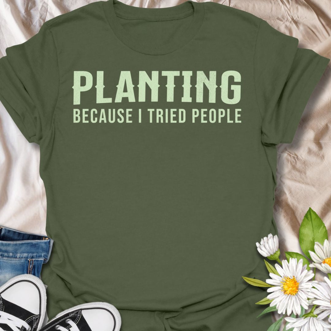 This Planting Because I Tried People t-shirt is made for gardeners and plant lovers who prefer soil, seedlings, and quiet plant time over unnecessary social interaction. Featuring bold simple typography with a funny introvert gardening message, this design has a clean, easy-to-wear look for everyday plant-parent style. Perfect for plant moms, plant dads, gardeners, houseplant lovers, introverts, and anyone who has officially chosen planting over people.