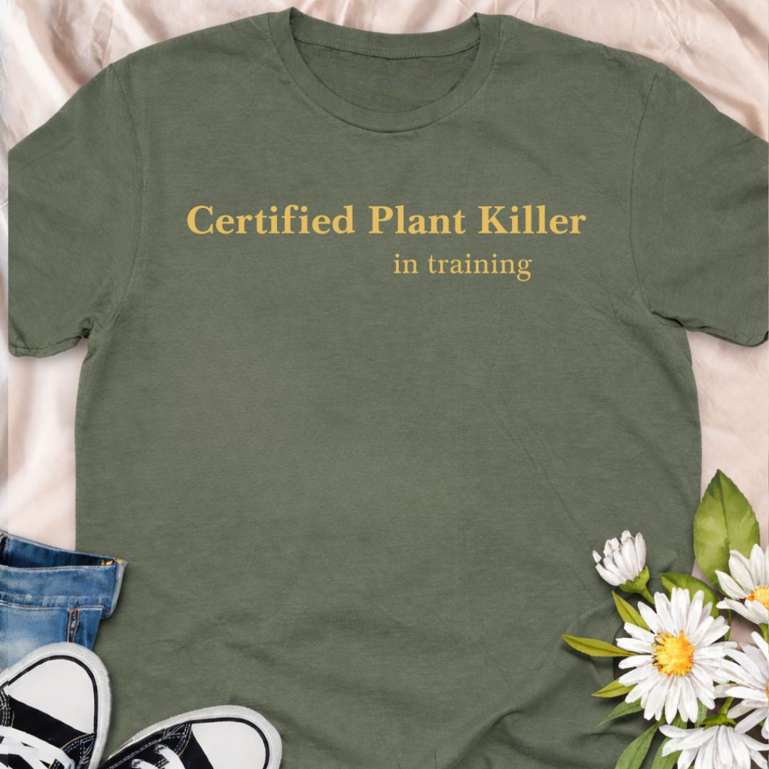 Own your not-so-green thumb with this “Certified Plant Killer in Training” t-shirt. A playful plant lover tee that makes a perfect funny gift for new plant parents still learning how to keep their houseplants alive.