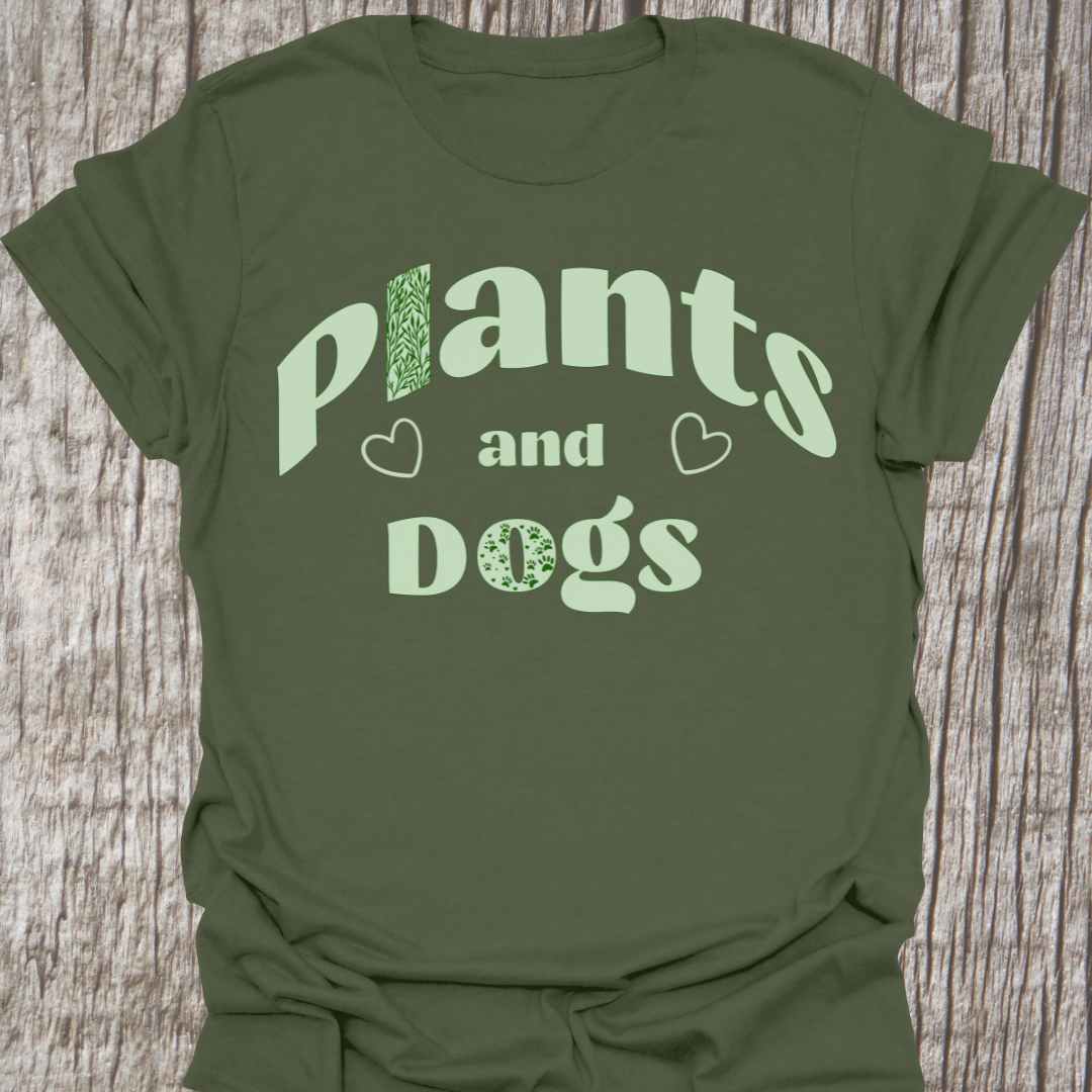 Plants and Dogs in text with subtle paw prints and leaves within the text design, decorated with two small hearts. Light green on a military green t-shirt