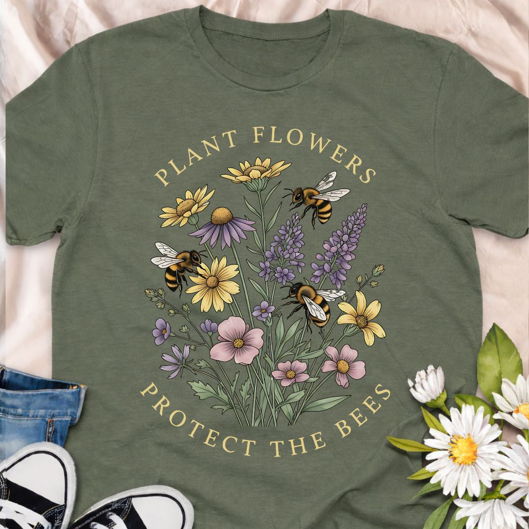 Spread a pollinator-friendly message with this “Plant Flowers, Protect the Bees” wildflower t-shirt. Packed with colorful blooms and busy bees, it’s a beautiful eco-conscious gift for gardeners, beekeepers, and nature lovers.