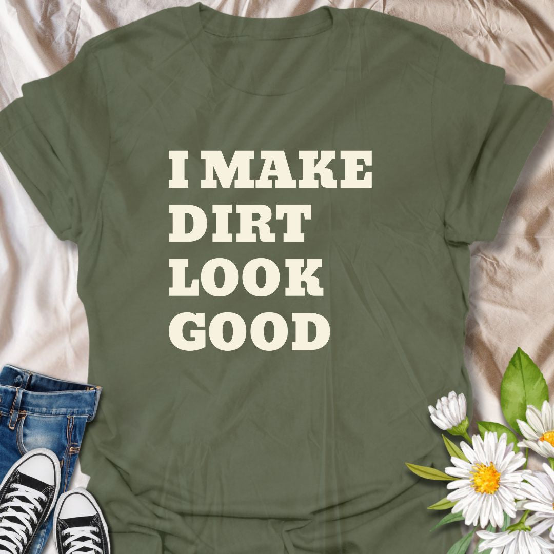 Show off your gardening pride with this funny graphic t-shirt featuring the playful phrase "I Make Dirt Look Good." Perfect for gardeners, plant lovers, and anyone who enjoys humor and style while spending time in the garden.