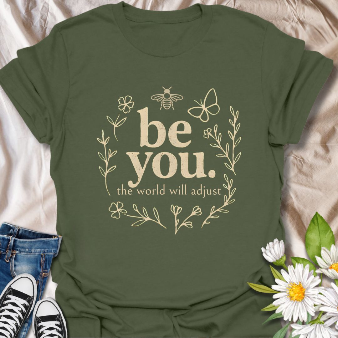 Empower your individuality with this inspiring “be you, the world will adjust” t-shirt design. Featuring whimsical floral and nature-themed elements like bees and butterflies, this uplifting graphic tee promotes self-love, confidence, and authenticity — ideal for free spirits and positivity lovers.