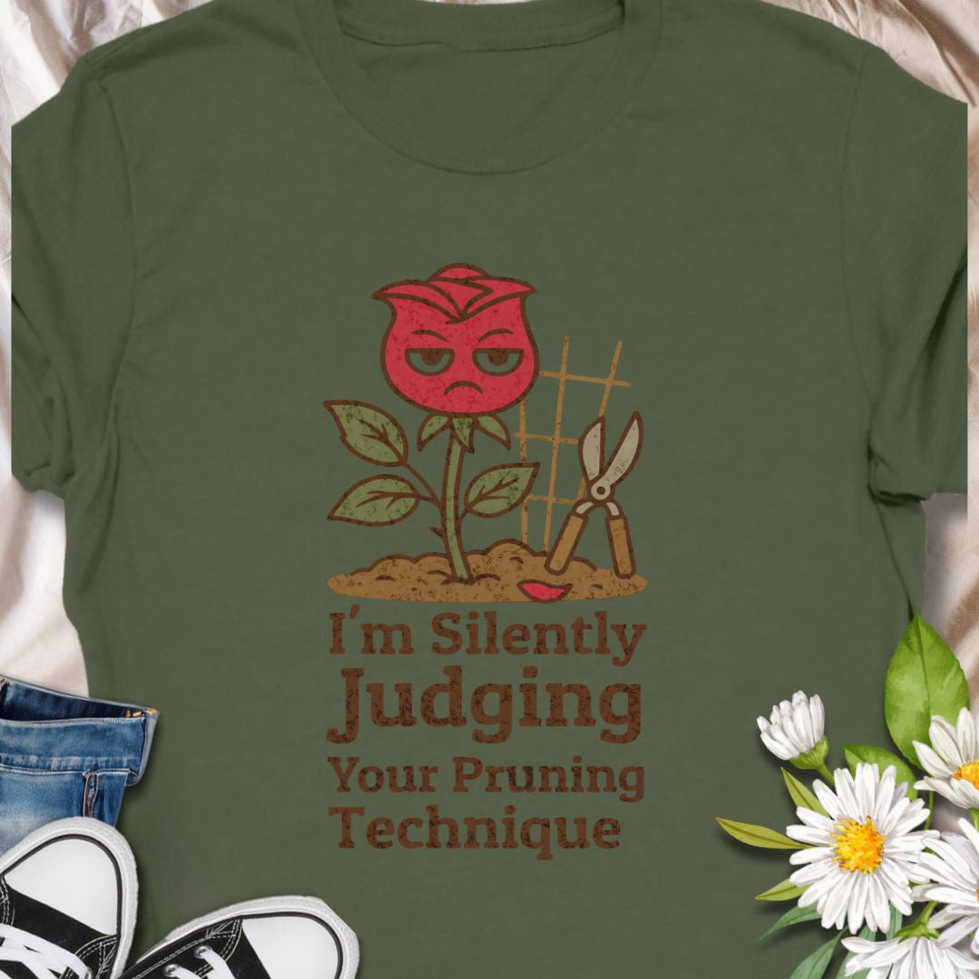Bring humor to the garden with this “I’m Silently Judging Your Pruning Technique” shirt featuring a sassy red rose. Perfect for gardeners who love their plants trimmed just right and have a sense of humor to match. Makes a great gift for plant lovers and gardening enthusiasts.