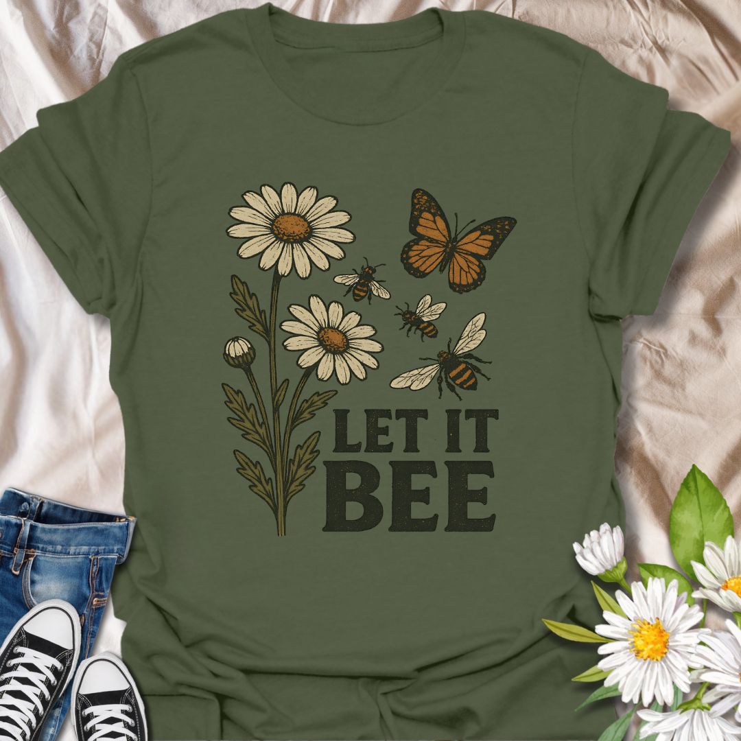 Spread a positive eco-friendly message with this charming graphic t-shirt featuring daisies, bees, a butterfly, and the playful phrase "Let It Bee." Perfect for pollinator supporters, nature lovers, and anyone who enjoys whimsical botanical-themed apparel.