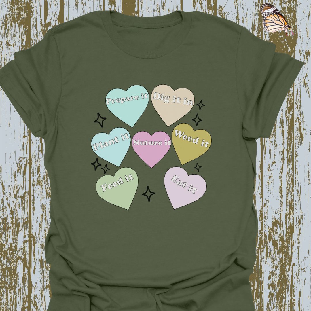Hearts with plant-related text in pastel colors on a military green T-shirt
