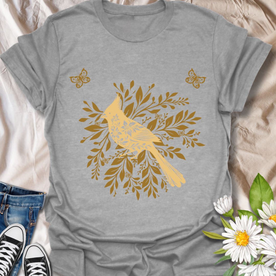 Charming bird and foliage t-shirt featuring a golden bird perched among stencil design botanical leaves. Perfect for bird lovers, nature fans, and botanical art enthusiasts. Sport grey
