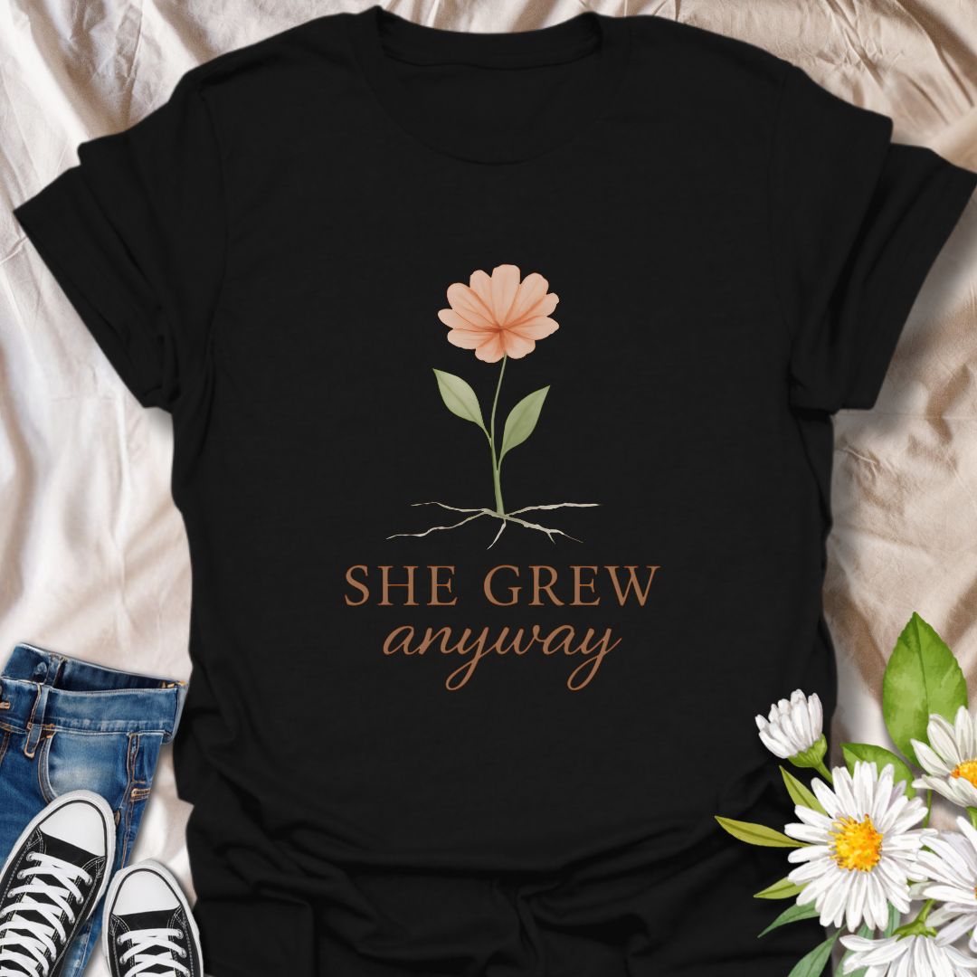 Celebrate resilience and personal growth with the “She Grew Anyway” t-shirt. Featuring a delicate hand-drawn flower with exposed roots, this inspirational design symbolizes strength, healing, and blooming through adversity. Perfect for mental health awareness, self-love, and empowerment, this floral graphic tee makes a meaningful gift for women, plant lovers, and anyone on a journey of growth and self-discovery.