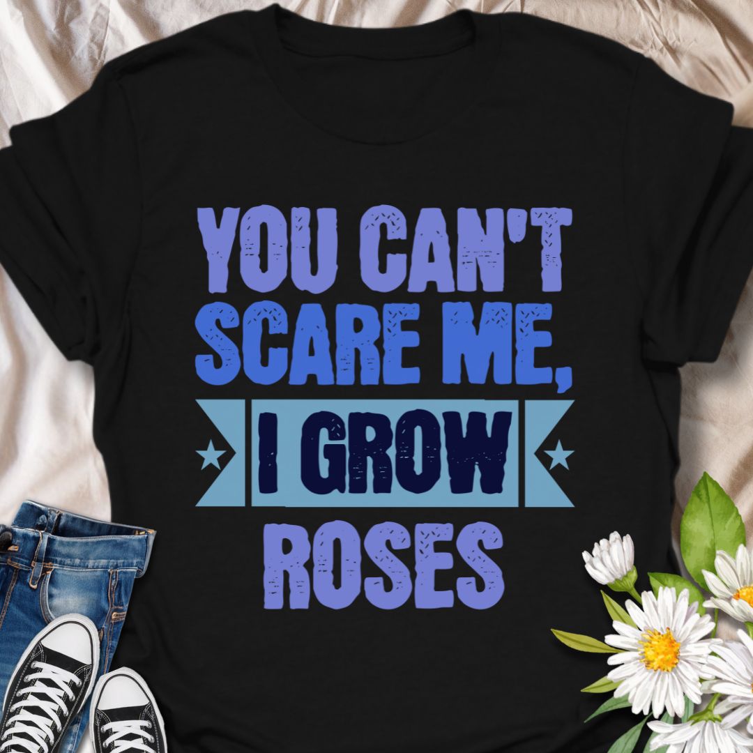 Show off your fearless green thumb with this bold "You Can't Scare Me, I Grow Roses" t-shirt. Designed for confident gardeners and rose enthusiasts who know the thorny truth of growing beauty. A perfect gift for plant lovers who aren’t afraid of a few pricks!
