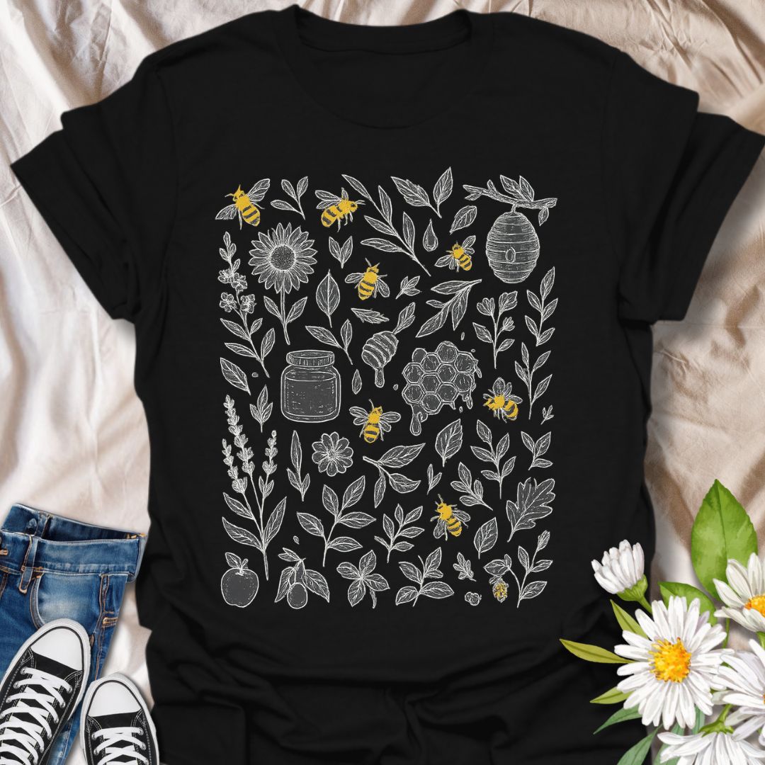 Celebrate nature and pollinator protection with this beautifully detailed t-shirt featuring hand-drawn floral illustrations and buzzing bees. A perfect choice for eco-conscious fashion lovers, gardeners, and bee conservation supporters who enjoy botanical and nature-inspired designs.