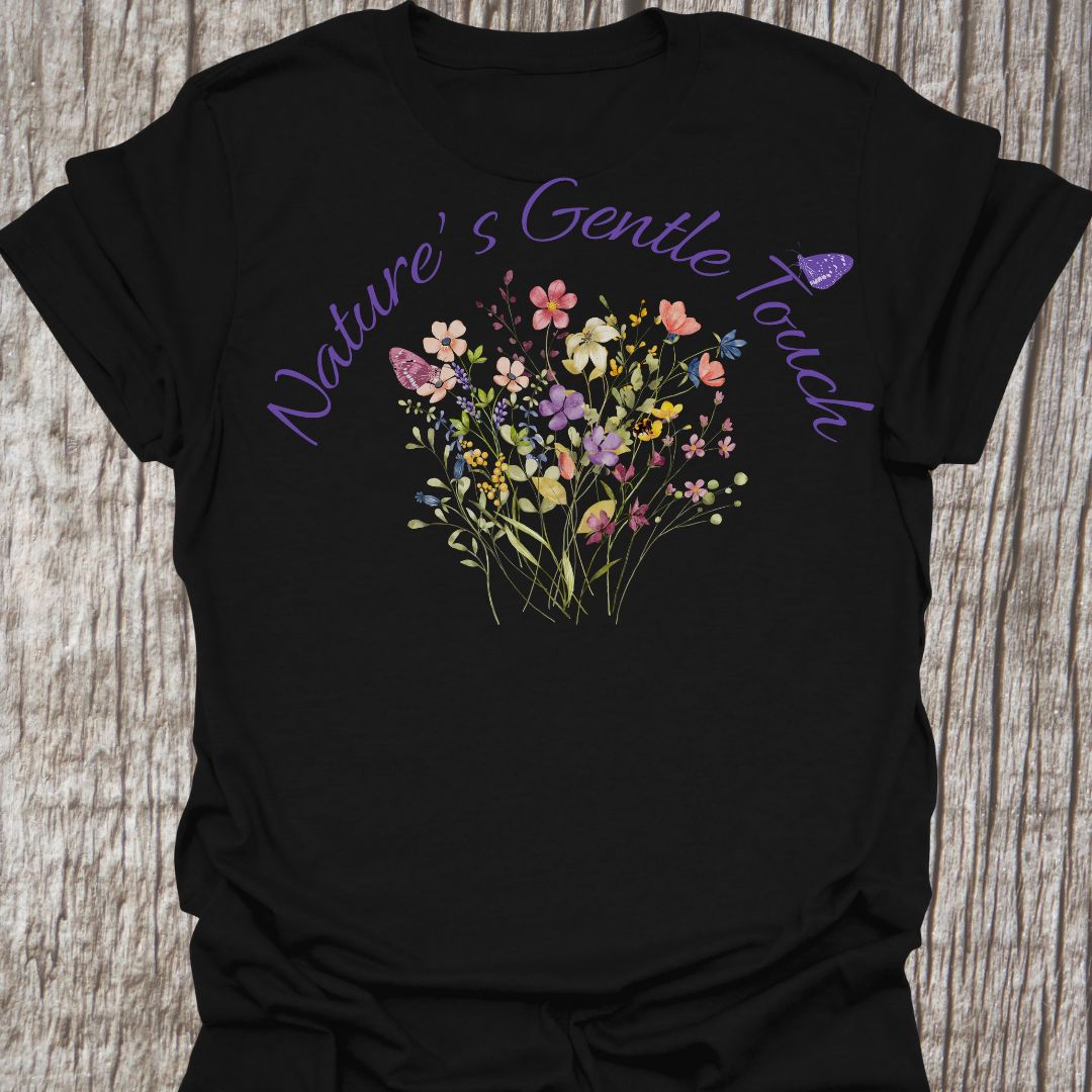 Beautiful flowers black T-shirt, 'Nature's Gentle Touch' curving around flowers in a lilac font, and a butterfly gently resting within the design.