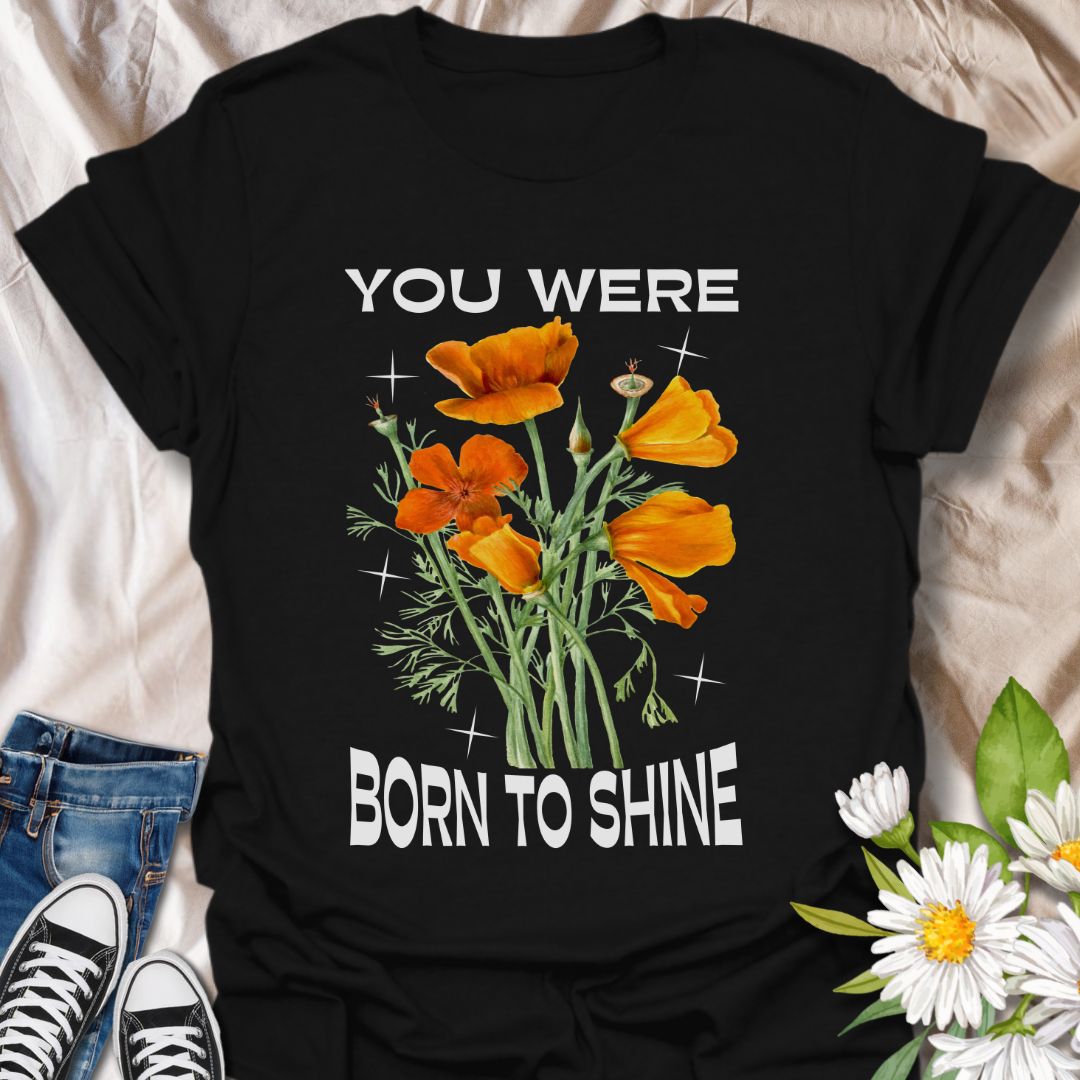Shine bright with this motivational floral graphic t-shirt featuring vibrant orange poppies and the uplifting phrase "You Were Born to Shine." Perfect for positivity seekers, flower lovers, and anyone who enjoys bold, inspirational, and nature-inspired apparel.