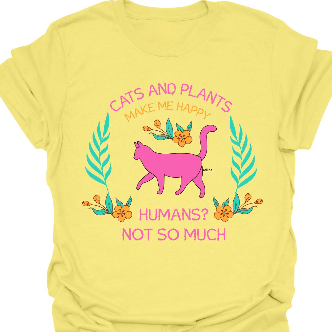 Cat and Plants Make Me Happy, Humans? Not So Much text and image design with pink cat as main image and decorative leaves, and flowers. Cornsilk t-shirt