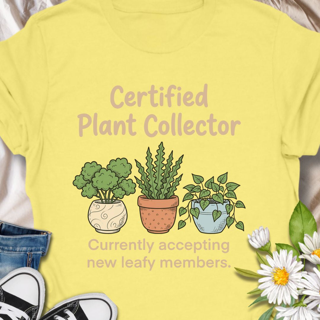 Show off your green thumb with this “Certified Plant Collector” t-shirt featuring charming potted plants and the phrase “Currently accepting new leafy members.” Perfect for plant parents, indoor jungle enthusiasts, or anyone who can’t resist bringing home another plant. A cozy and fun gift for birthdays or plant swaps.