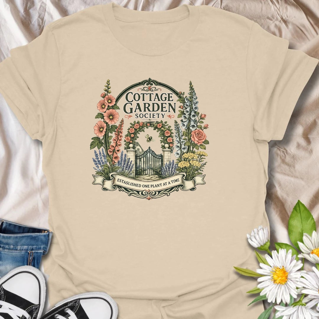 Cottage garden t-shirt with floral gate artwork, vintage garden society style, and a soft botanical feel for gardeners and flower lovers.