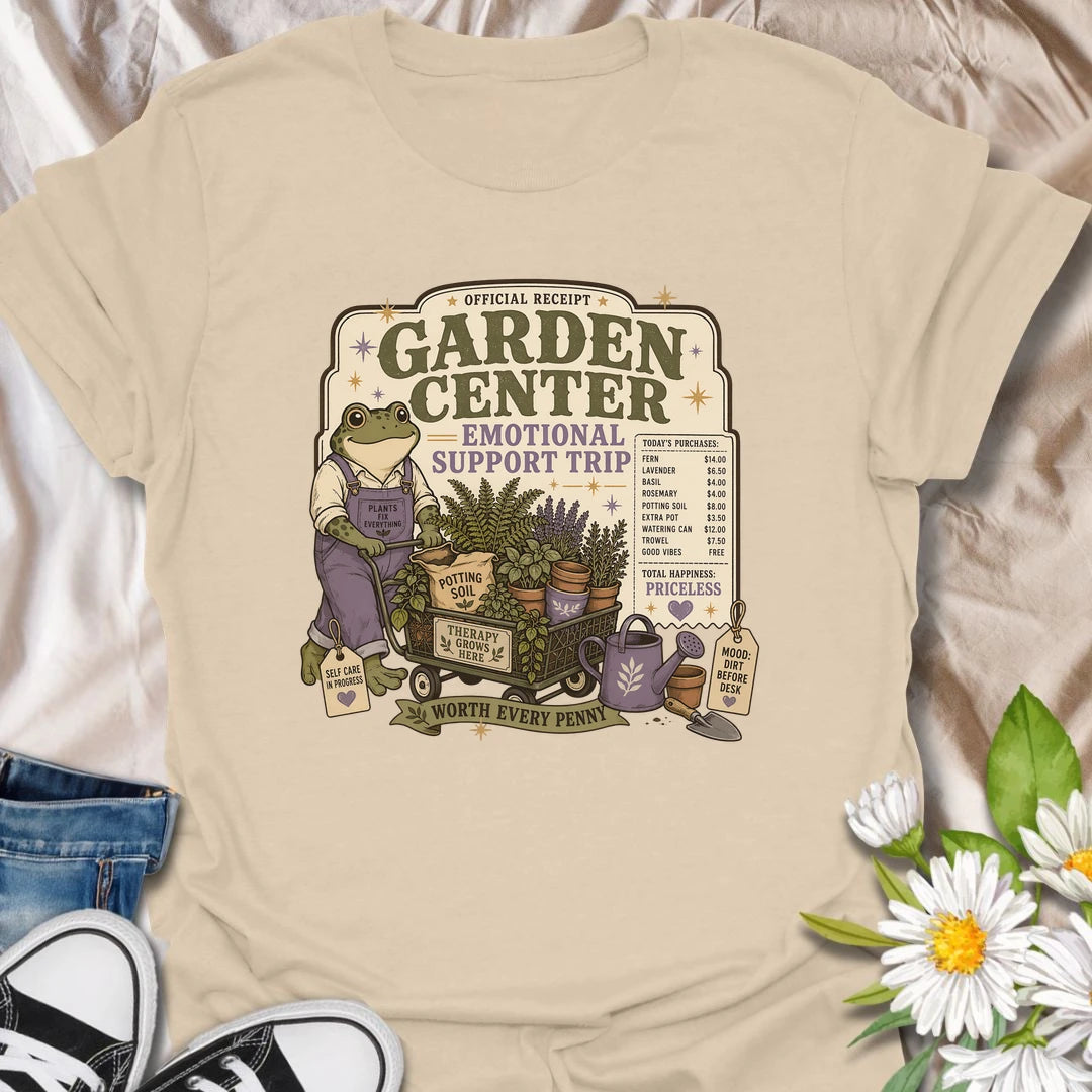 Funny gardening t-shirt featuring a cheerful frog and a garden center “emotional support trip.”
This playful design celebrates plant shopping, self-care, and the joy of bringing home more greenery.
A fun gift for gardeners, frog lovers, plant moms, and anyone who believes a garden center trip is worth every penny.
