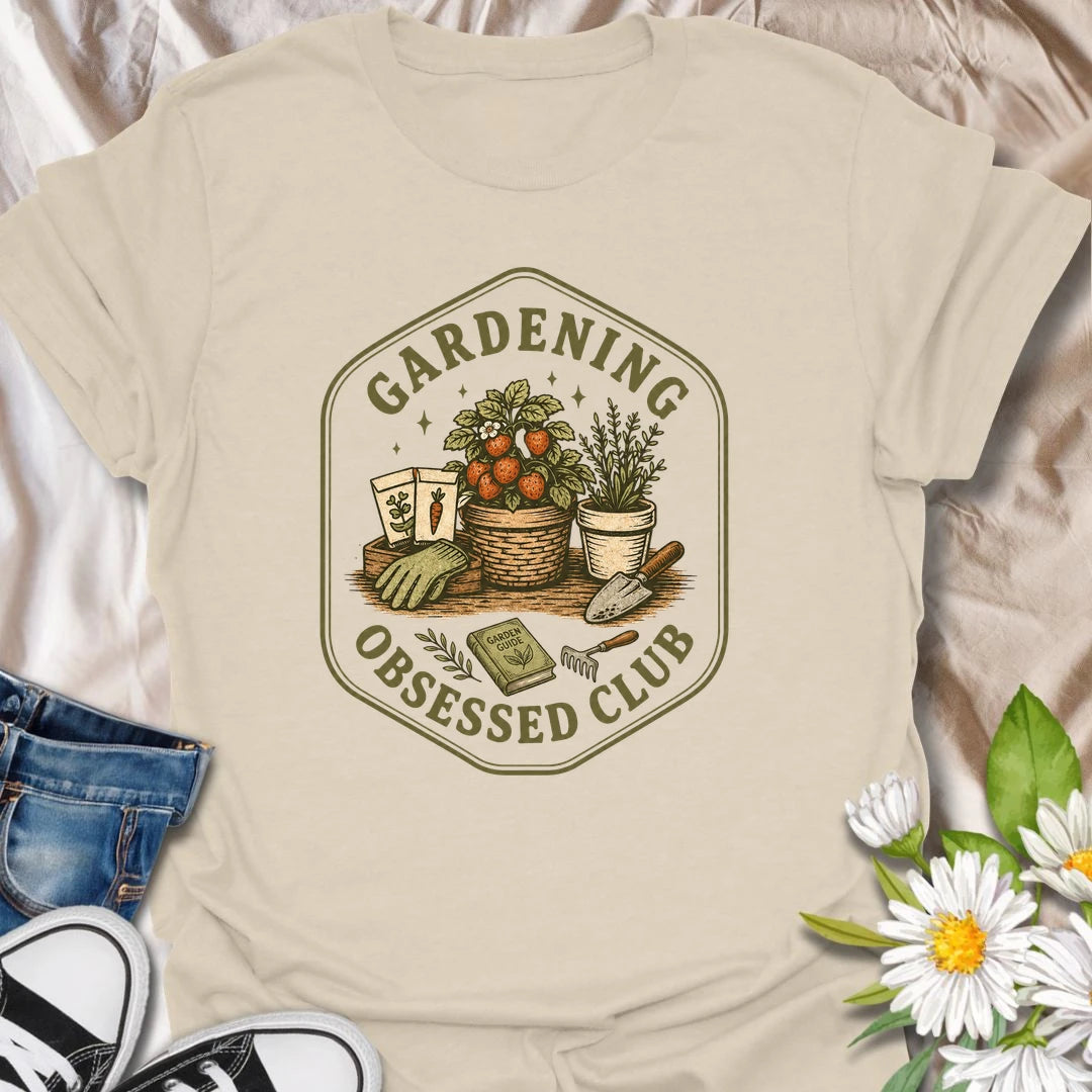 Gardening Obsessed Club t-shirt for anyone who treats gardening like a hobby, lifestyle, and personality trait.
The vintage badge design features baskets, herbs, tomatoes, garden tools, and potted plants in a cozy garden club style.
It is perfect for gardeners, backyard growers, herb lovers, vegetable gardeners, and plant-loving women.
A great gift for anyone who is happiest outside with soil, seeds, and something growing.