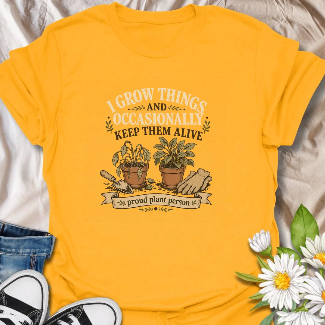 Funny gardening t-shirt for anyone who grows things and occasionally keeps them alive.
Features potted plants, gardening gloves, and a playful message that plant lovers will instantly relate to.
A fun gift for gardeners, beginner plant parents, and anyone with a realistic green thumb.