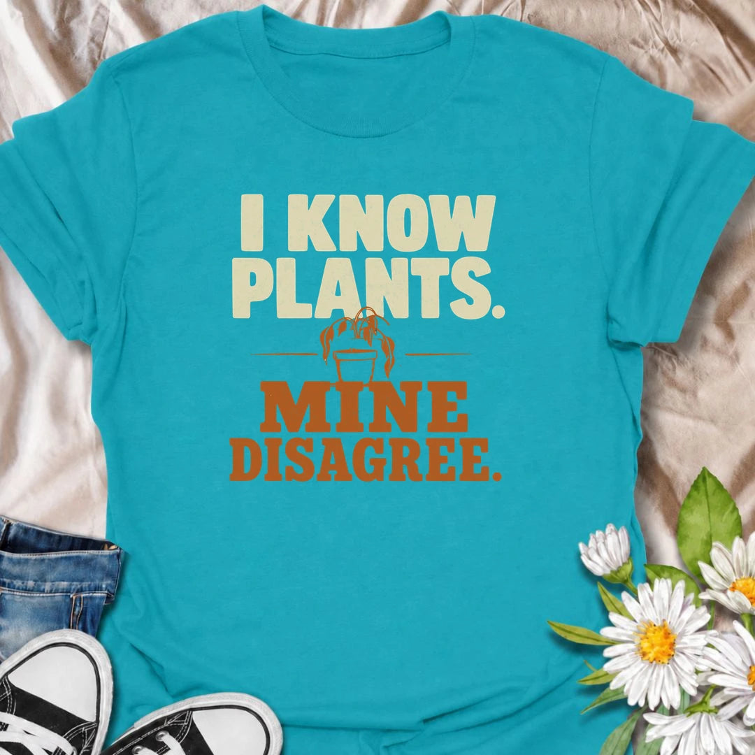 A funny plant T-shirt for anyone who knows plenty about houseplants but still somehow has one looking less than impressed. The bold “I Know Plants. Mine Disagree.” phrase captures the reality of plant parenting with just the right amount of self-deprecating humor. Perfect for houseplant lovers, indoor gardeners, and plant collectors who have learned that knowledge does not always equal cooperation. A great gift for pothos fans, propagation addicts, and anyone with a dramatic plant collection. Easy to wear,