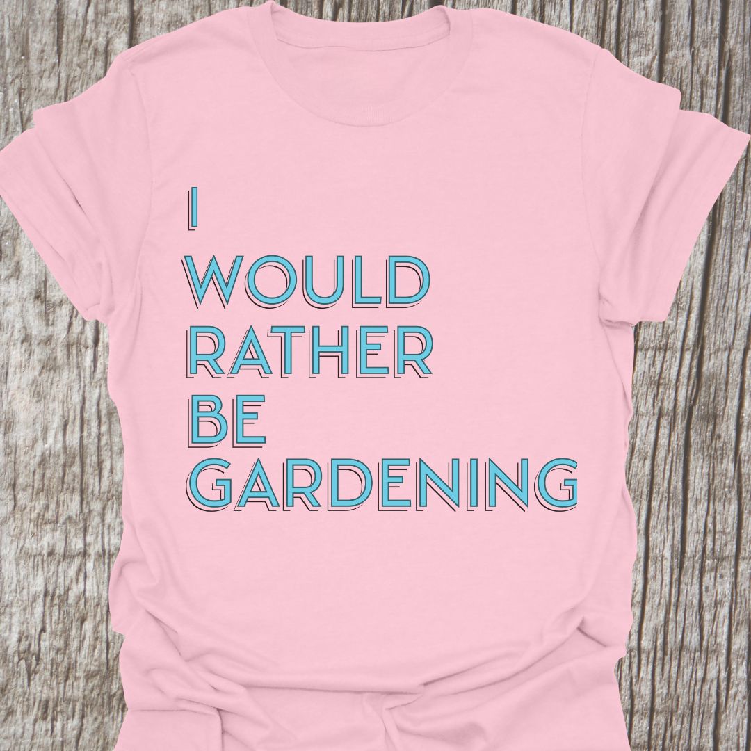 I Would Rather Be Gardening Text on light pink crew neck T-shirt
