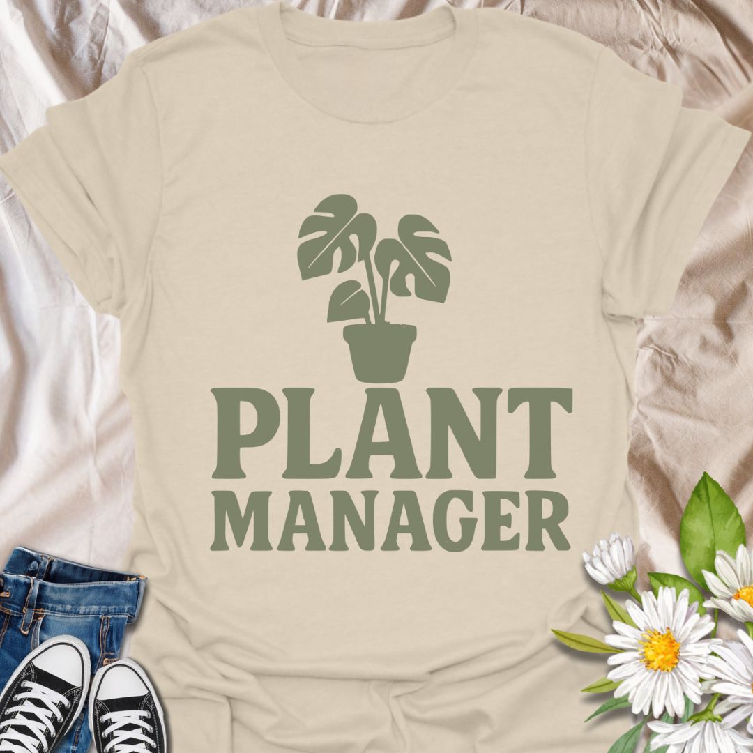 Show your houseplant pride with this humorous "Plant Manager" graphic t-shirt featuring a bold monstera illustration. Perfect for plant parents, gardening enthusiasts, and anyone who takes their indoor jungle seriously—with a sense of humor.