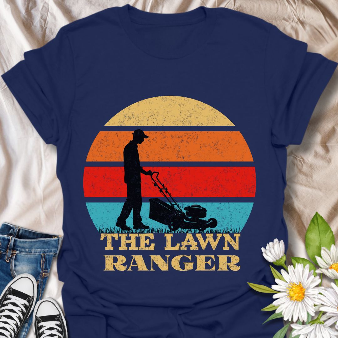 Hilarious retro-style t-shirt with a sunset silhouette of a man mowing the lawn and the phrase “The Lawn Ranger.” Perfect for dads, garden enthusiasts, or anyone who takes mowing seriously (or not!). Great gift for Father's Day or yard work pros. Navy