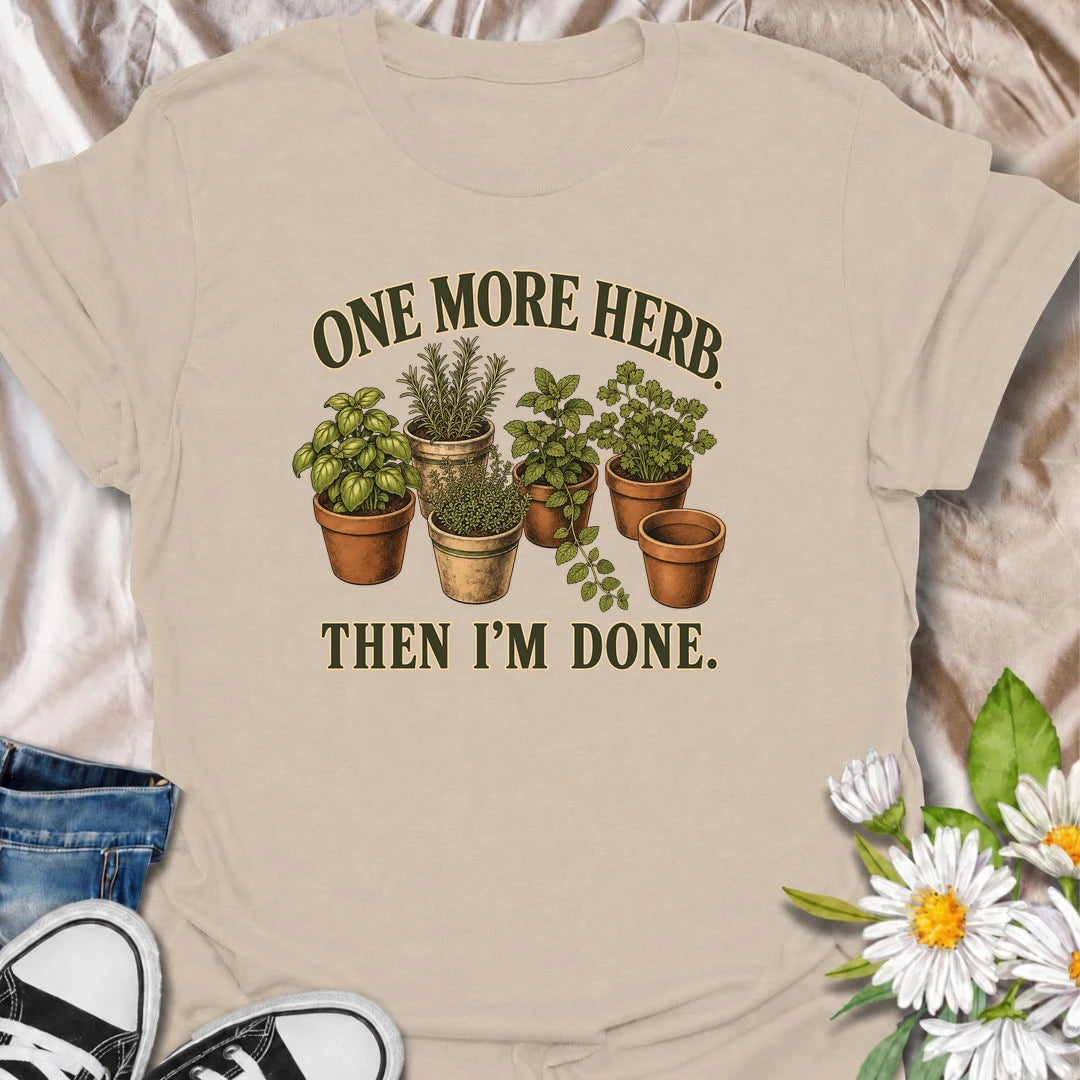 A funny herb garden T-shirt for anyone who keeps promising there is room for just one more pot. Featuring basil, rosemary, mint, thyme, and parsley in vintage-style planters, this design is perfect for kitchen gardeners and herb lovers. The phrase “One More Herb. Then I’m Done.” captures the very familiar habit of turning a small herb collection into an ever-growing one. It makes a great gift for home cooks, container gardeners, and anyone who loves growing fresh herbs. Ideal for gardening days, farmers mar