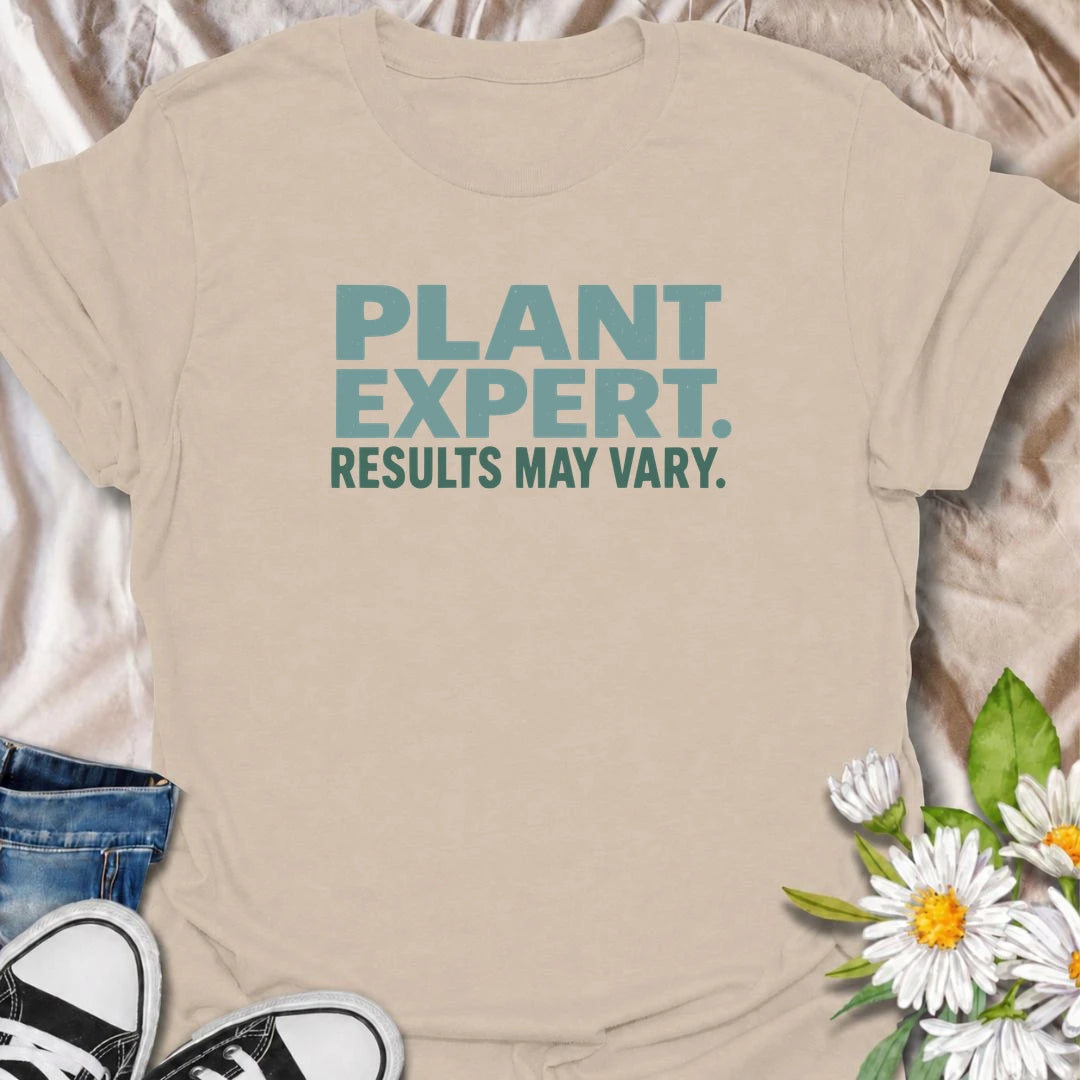 A funny plant T-shirt for anyone who gives great houseplant advice but knows the results are never guaranteed. The phrase “Plant Expert. Results May Vary.” adds dry, self-deprecating humor without overcomplicating the design. Perfect for plant parents, houseplant collectors, indoor gardeners, and anyone who has learned that every plant has a mind of its own. The clean typography makes it an easy everyday shirt and a fun gift for experienced growers and enthusiastic beginners alike. Ideal for nursery trips,