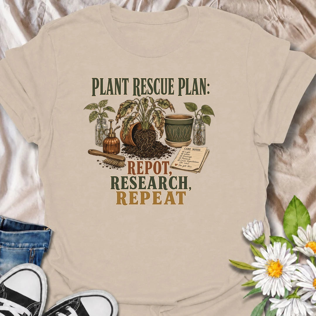 A funny plant rescue T-shirt for dedicated plant parents who repot, research, and repeat. Perfect for houseplant lovers who never give up on a struggling plant.