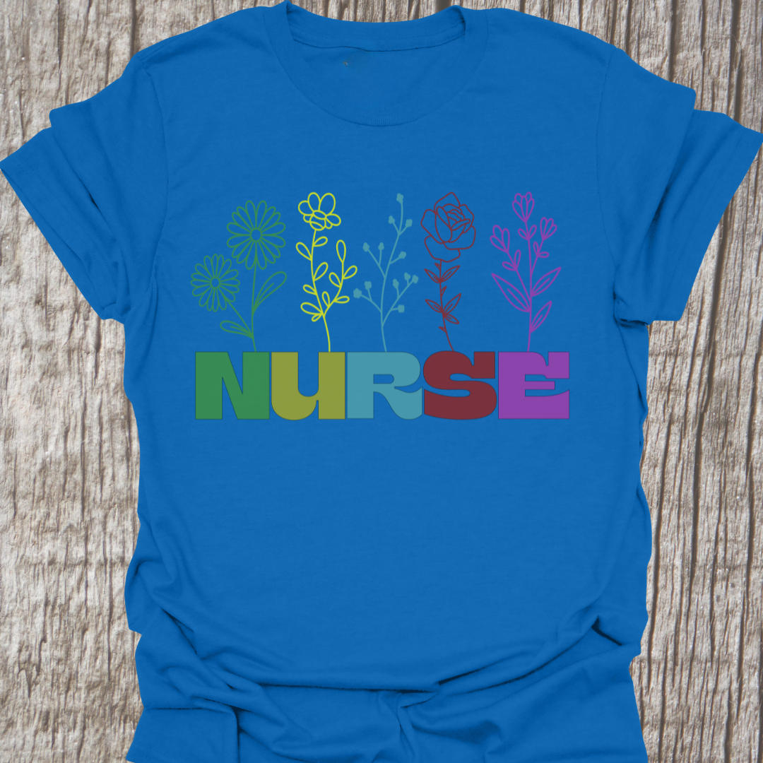 Beautiful Nurse t-shirt with the word NURSE each letter being a different color, with a flower attached to the letter in same color, on a royal blue t-shirt