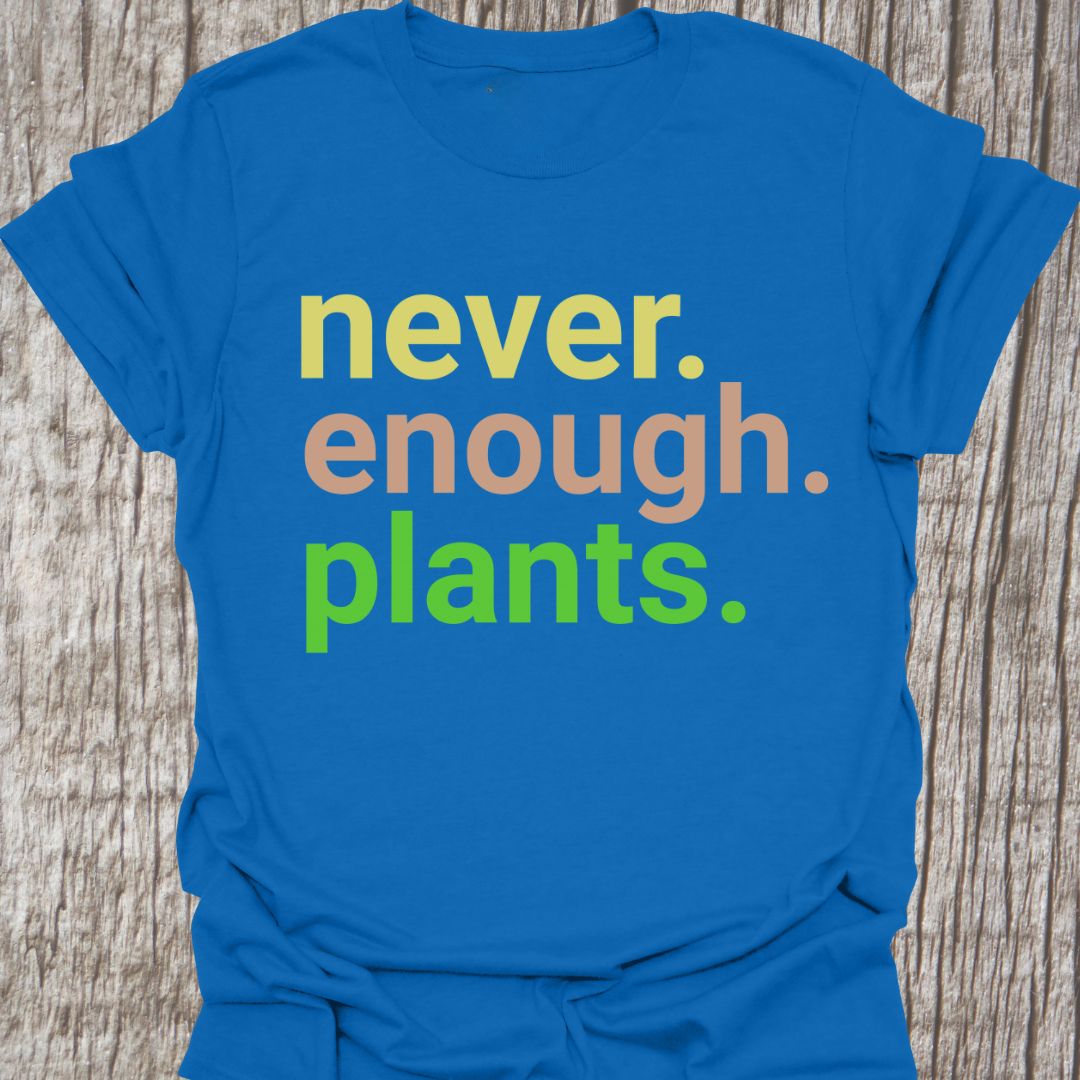 Text based design stating 'never enough plants' over three lines. Written in three colors on a royal blue t-shirt