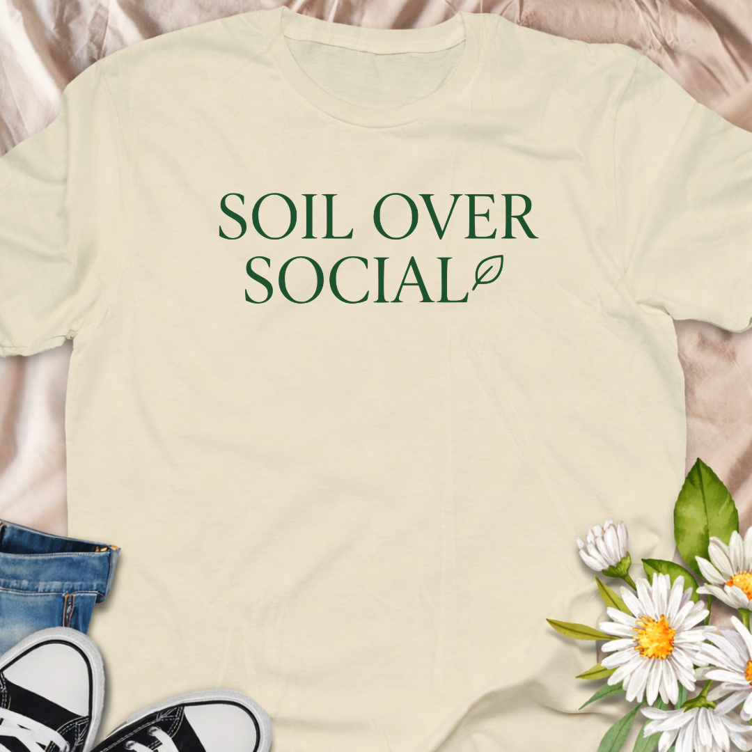 Bold “Soil Over Social” gardening t-shirt for plant lovers who’d rather be in the garden than online. A clean, minimalist botanical typography tee perfect for gardeners, plant moms, and cottagecore enthusiasts.