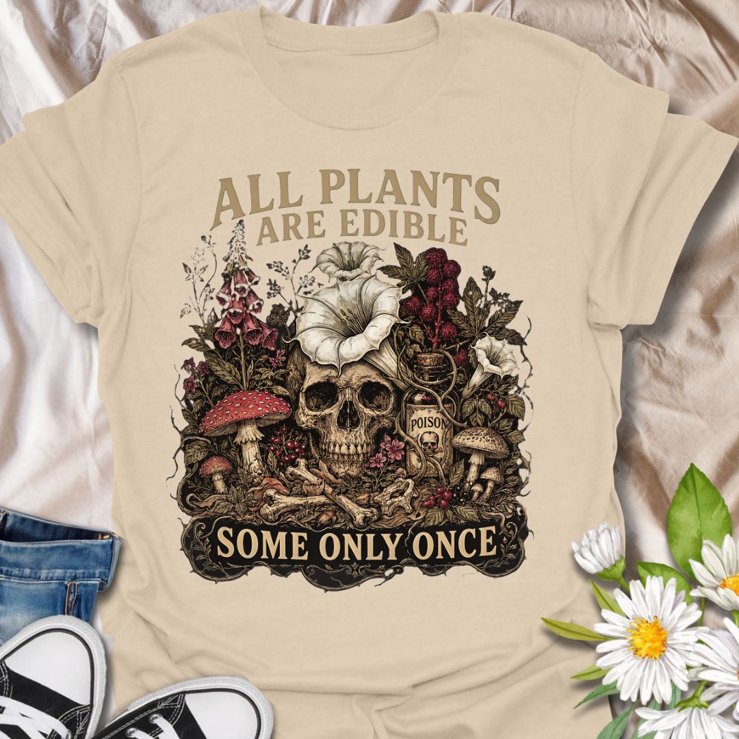 This All Plants Are Edible Some Only Once t-shirt is made for plant lovers with a dark sense of humor and a soft spot for spooky botanical artwork. Featuring a skeleton surrounded by mushrooms, plants, flowers, and vintage-style nature details, this design has a gothic garden feel with a funny cautionary plant message. Perfect for plant lovers, gardeners, mushroom fans, dark cottagecore style lovers, spooky season fans, and anyone who enjoys botanical humor with a slightly morbid twist.