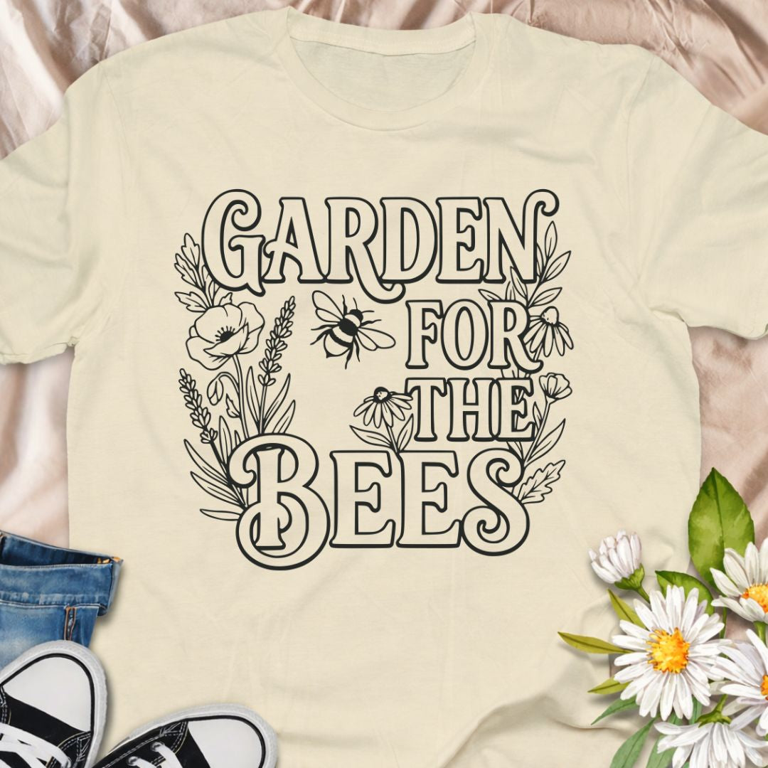 Celebrate pollinator-friendly gardening with this “Garden for the Bees” t-shirt featuring wildflowers and a bee illustration. Perfect for gardeners, plant lovers, and eco-conscious shoppers who support bees, biodiversity, and sustainable gardens. A thoughtful gift for nature lovers and environmental advocates.