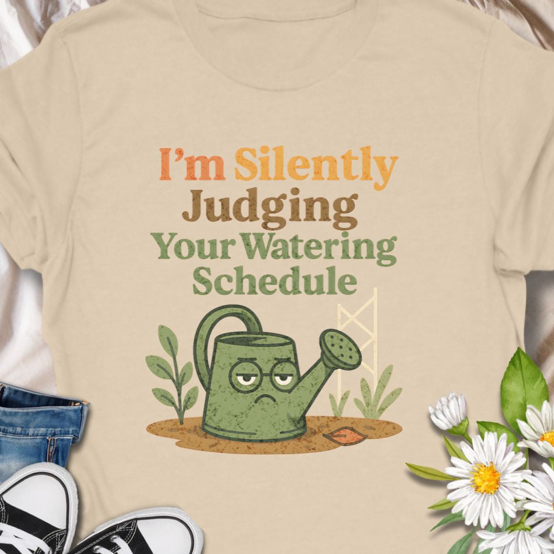 Show off your plant-parent sass with this “I’m Silently Judging Your Watering Schedule” tee featuring a grumpy watering can. A hilarious gift for moms, dads, grandparents, anyone who enjoys their garden. This tee shows a love for keeping leafy friends happy, in a sarcastic way. Ideal for houseplant lovers and garden geeks alike.