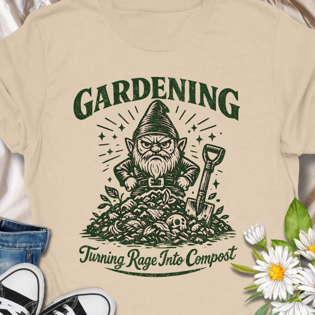 Channel your stress into soil with this “Gardening – Turning Rage Into Compost” t-shirt featuring a grumpy garden gnome standing over a compost pile. A perfect funny gift for gardeners, allotment lovers, and plant parents who use weeding and digging as their favorite form of therapy.