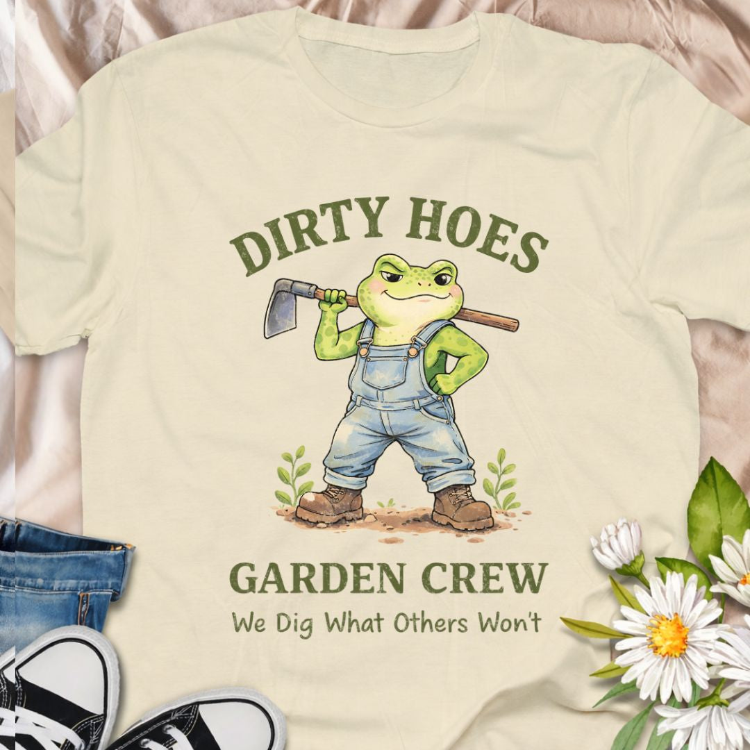 Join the “Dirty Hoes Garden Crew” in style with this cheeky frog gardener t-shirt. A fun punny gardening tee for plant lovers who dig in the dirt and don’t mind getting a little messy in the garden.
