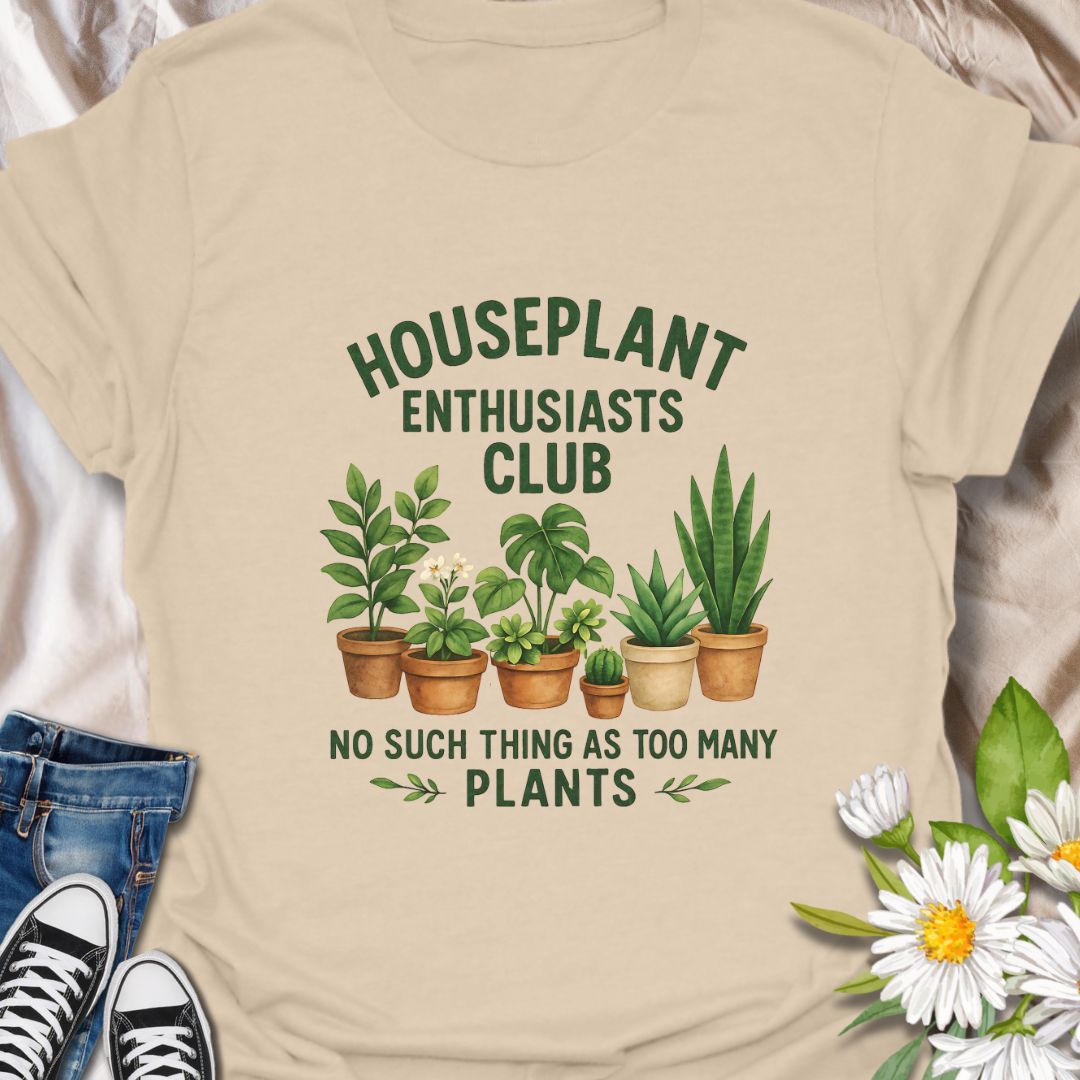 Join the green-thumbed crew with this fun and quirky “Houseplant Enthusiasts Club” shirt. Featuring a lineup of adorable potted plants, this tee is perfect for indoor plant lovers who believe there’s no such thing as too many plants. A must-have for houseplant collectors, plant moms, plant dads, and foliage fanatics.