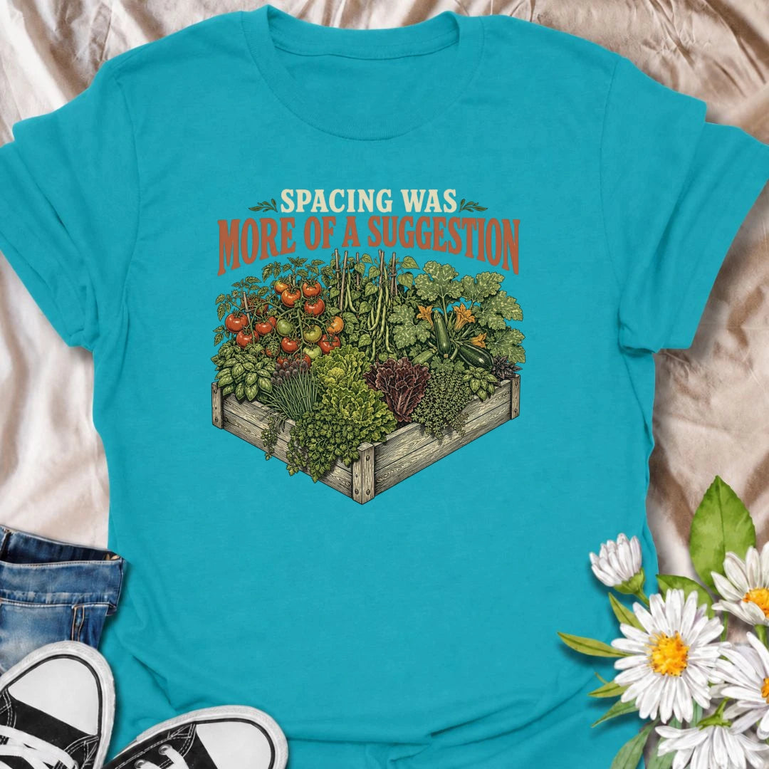 A funny gardening T-shirt for anyone who treats recommended plant spacing as more of a guideline than a rule. Featuring an overflowing raised garden bed packed with tomatoes, greens, herbs, and vegetables, this design is perfect for enthusiastic backyard growers. The phrase “Spacing Was More of a Suggestion” captures the familiar chaos of squeezing in just one more plant. It makes a great gift for vegetable gardeners, raised-bed growers, and anyone who loves a densely planted garden. Ideal for garden days,