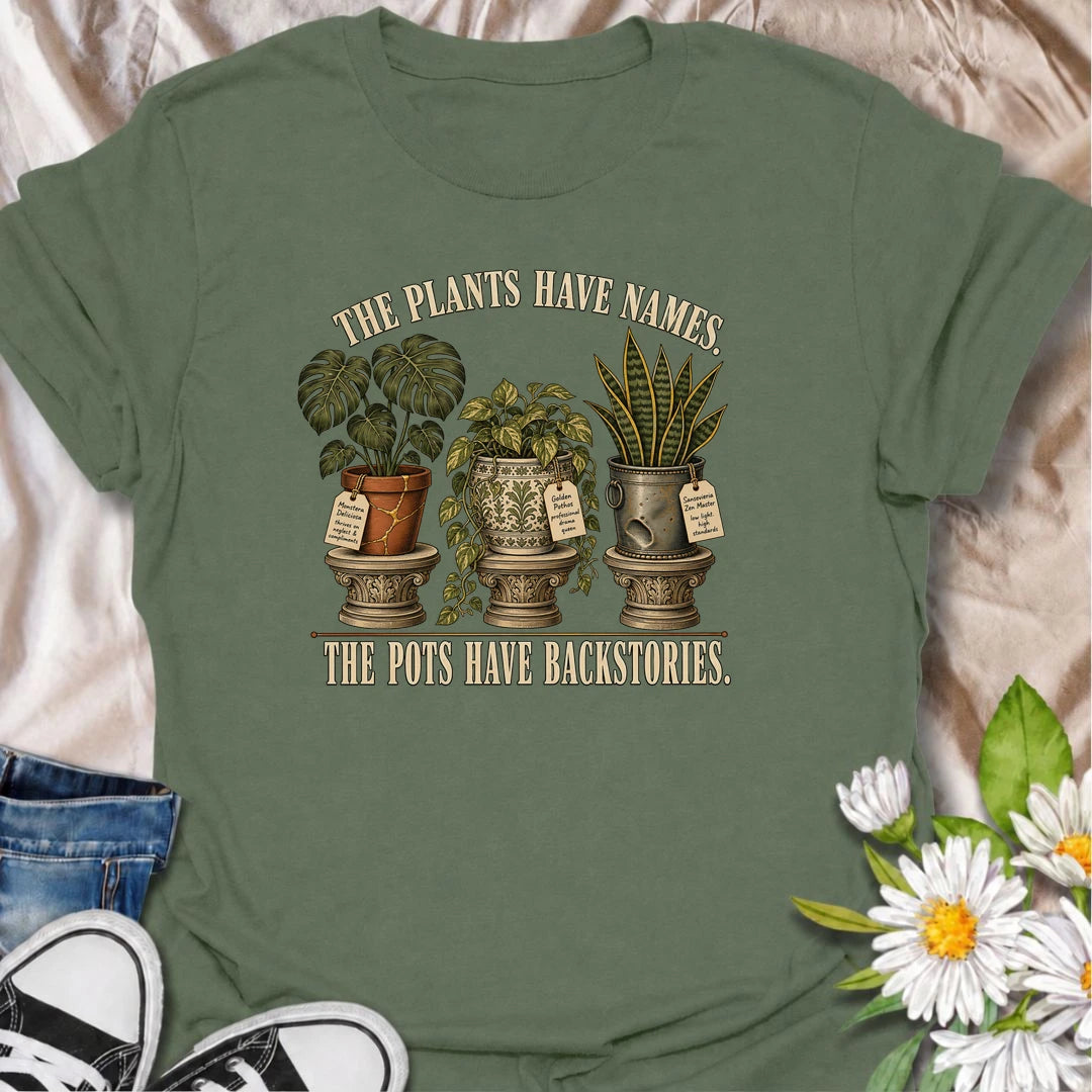 A funny houseplant T-shirt for plant parents who know every plant’s name and every pot’s backstory. Perfect for collectors with dramatic greenery.