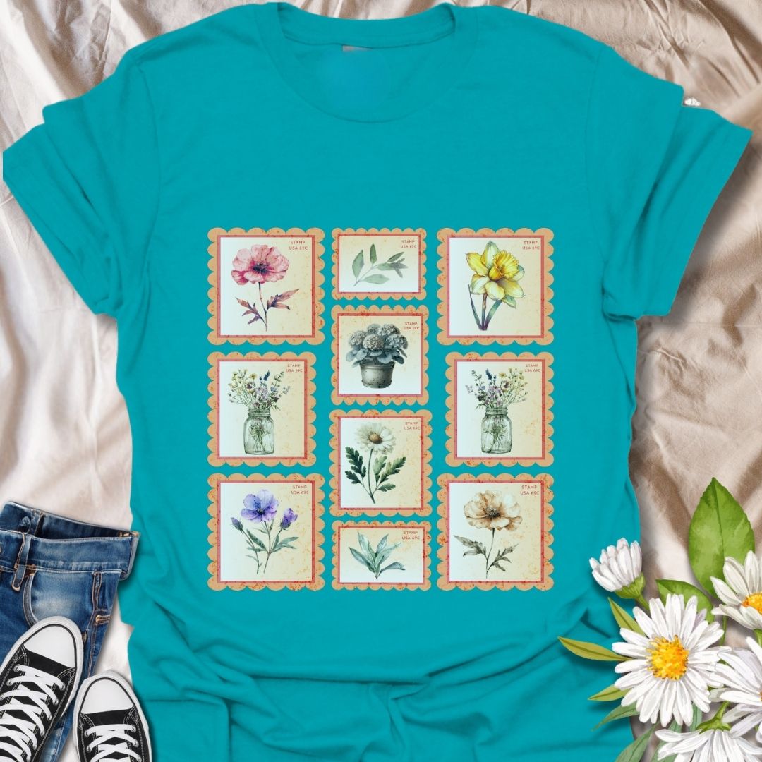 Vintage floral postage stamp t-shirt featuring watercolor botanical prints framed like charming retro stamps. Perfect for flower lovers, gardeners, cottagecore fans, and nature-inspired fashion. Ideal gift for plant moms, wildflower enthusiasts, and those who adore vintage aesthetics