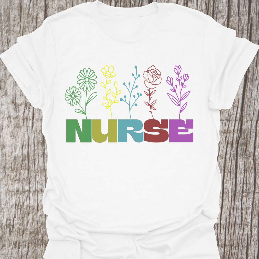 Beautiful Nurse t-shirt with the word NURSE each letter being a different color, with a flower attached to the letter in same color, on a white t-shirt